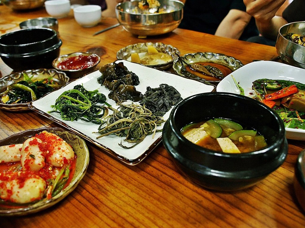 A tidy Korean temple-style tray of vegetable banchan with doenjang stew — banchan korean side