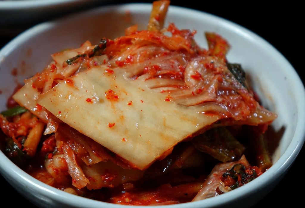 Red napa cabbage kimchi, Korea's iconic fermented dish — kimchi white chili
