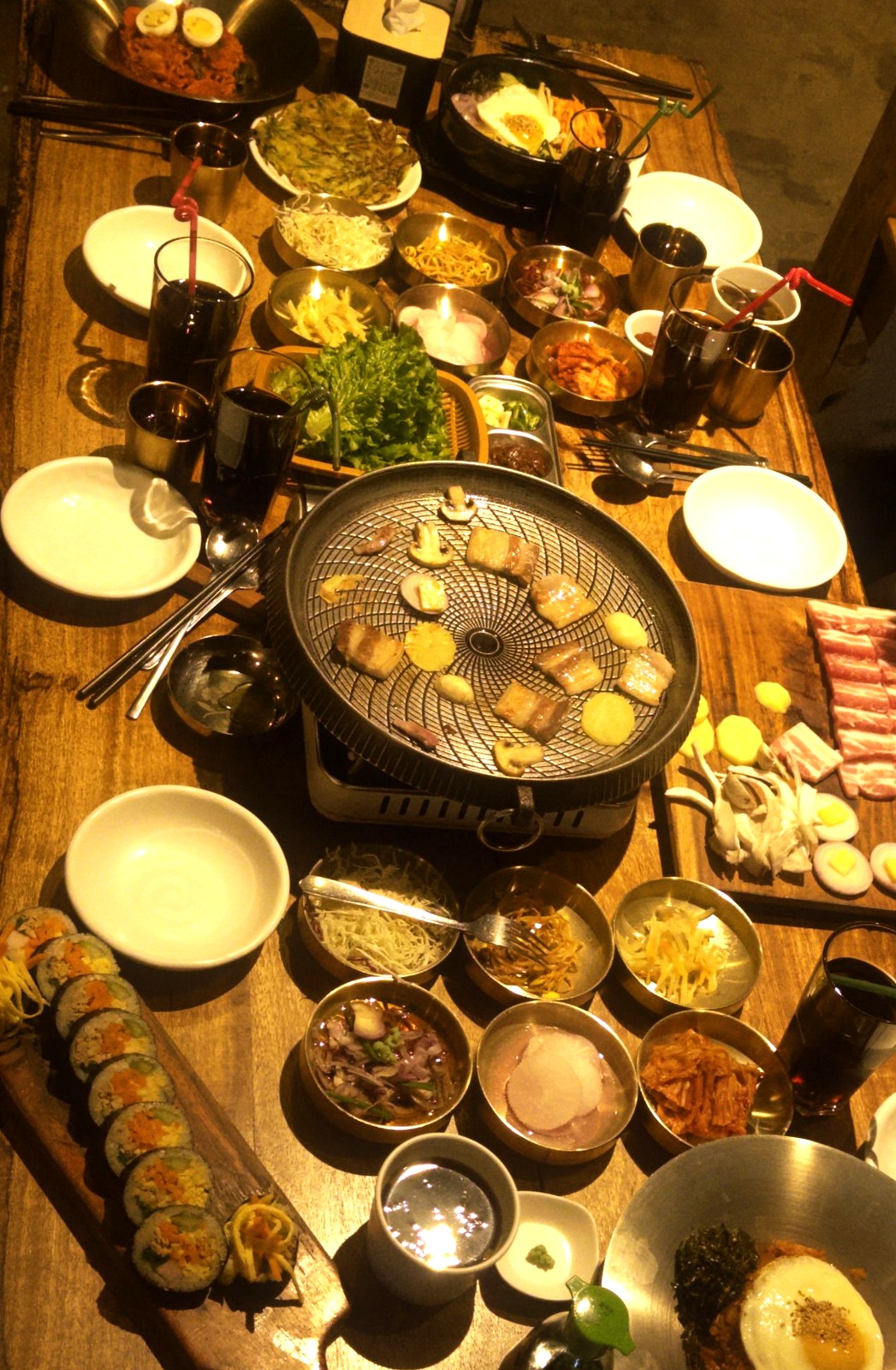 Galbi, marinated Korean short ribs grilling over charcoal — korean bbq sejong