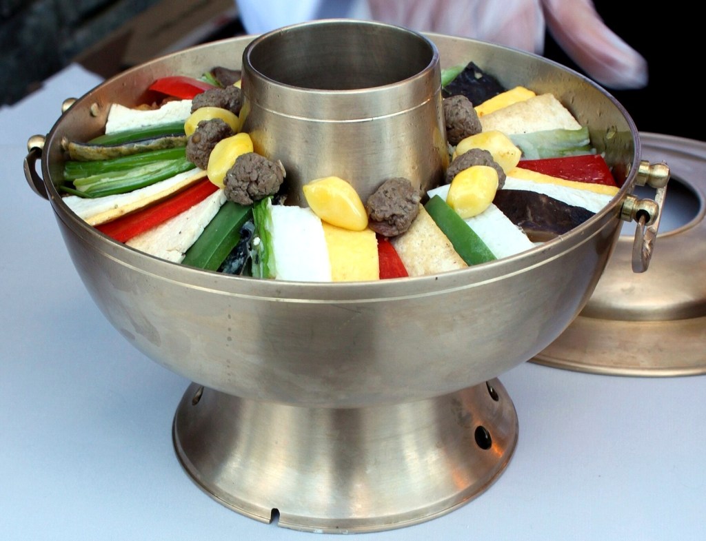 Sinseollo, an ornate Korean royal hot pot with colorful arranged ingredients — korean royal cuisine
