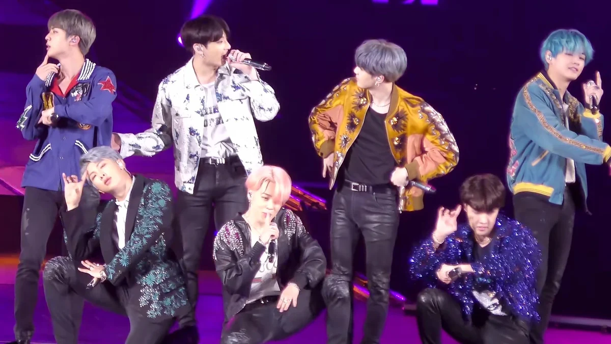BTS performing on stage during a stadium concert — bts grammy arirang
