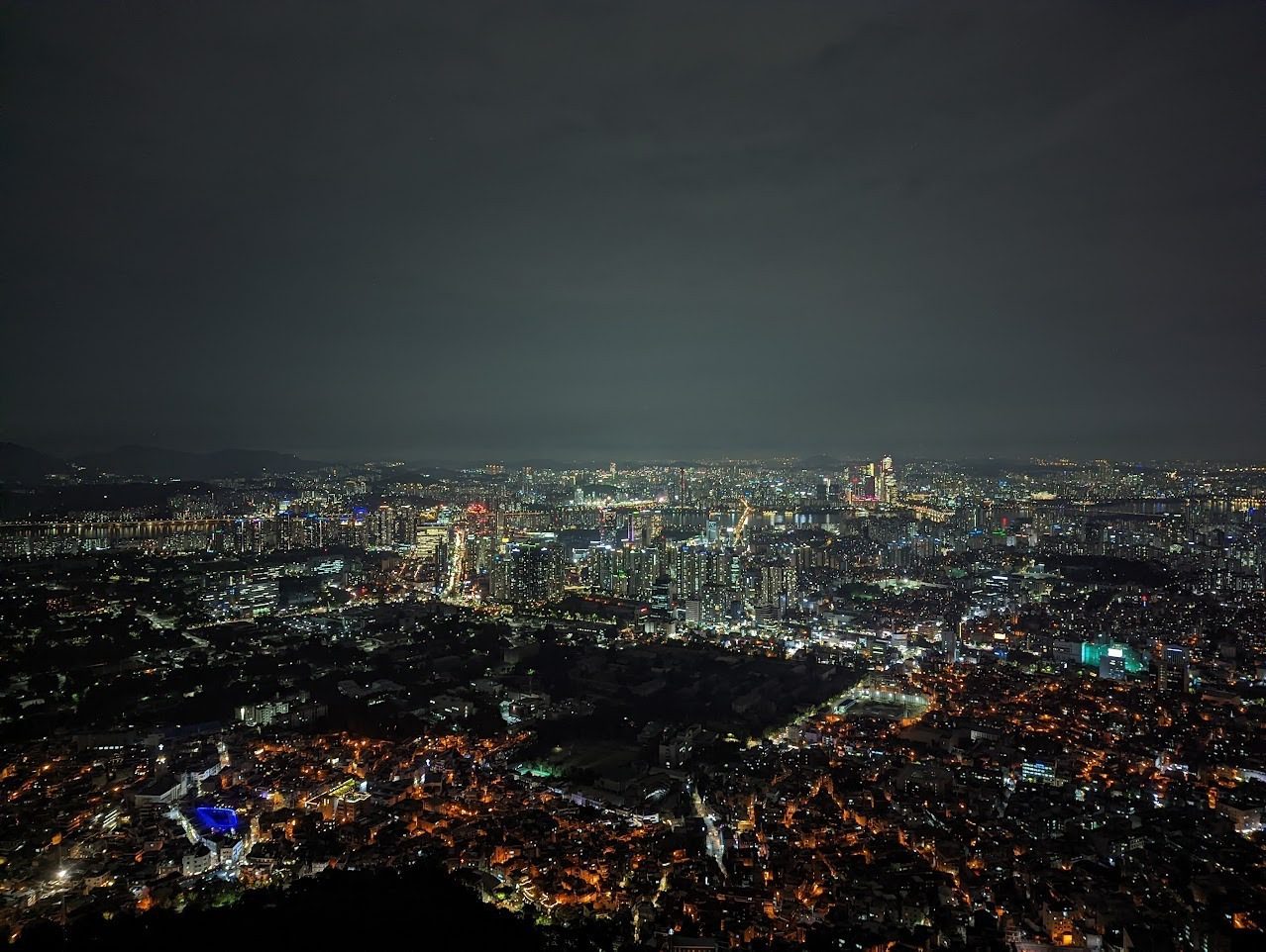 Aerial night view of the Seoul skyline in South Korea — song kang military